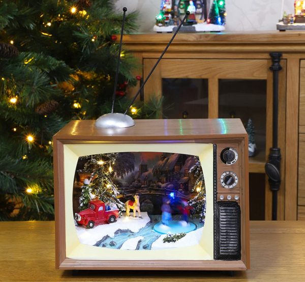 Scène de noël musicale dans un téléviseur rétro | Idées cadeaux déco insolites pour Noël